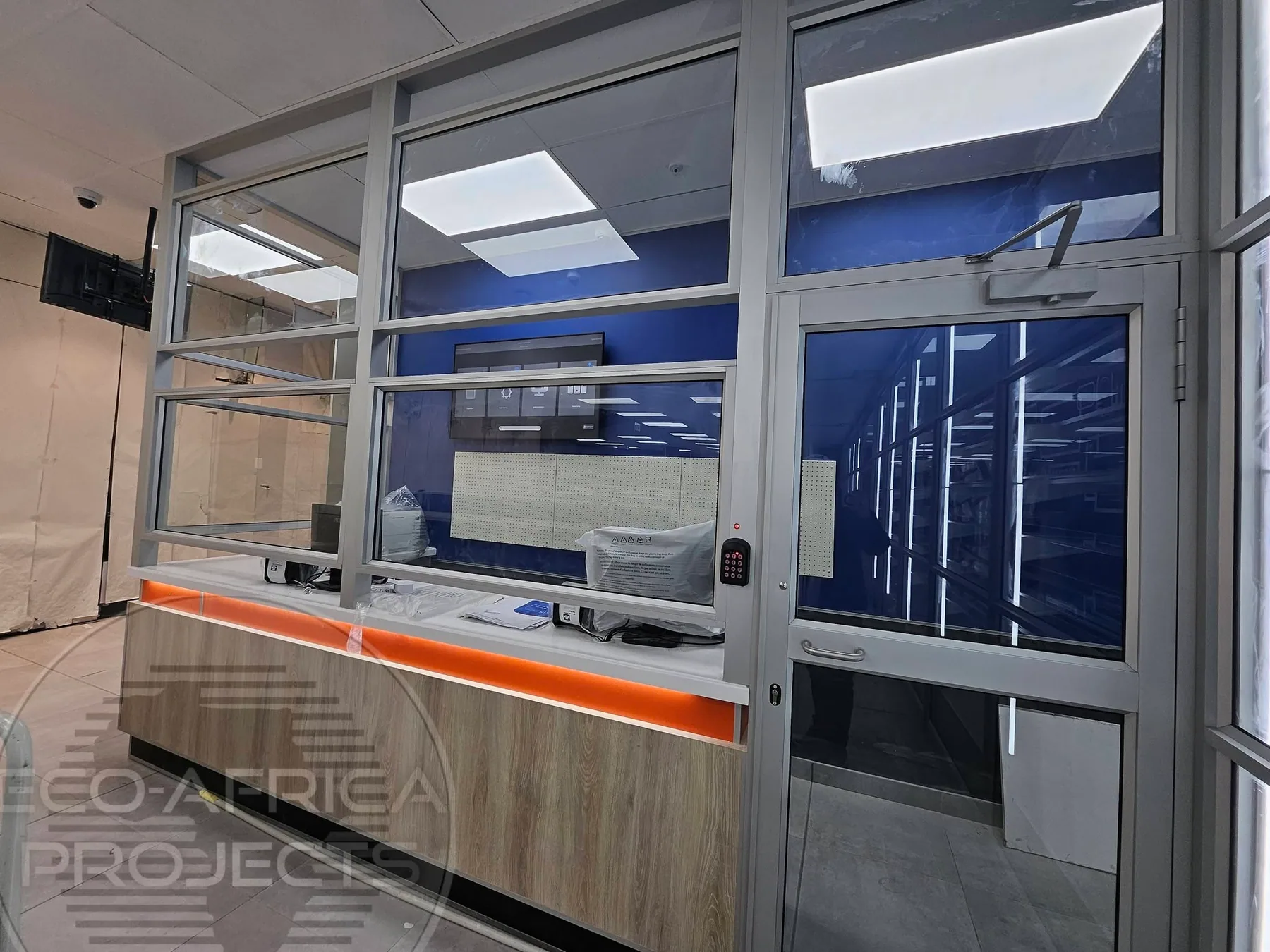 Aluminium-framed counter and service glazing